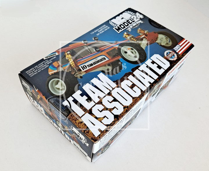 Model car kit packaging with Team Associated branding on a white background