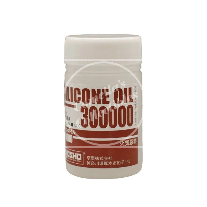 A white plastic bottle of Kyosho Silicone Oil 300000 with a white cap, featuring a white label with bold red text, set against a plain white background.