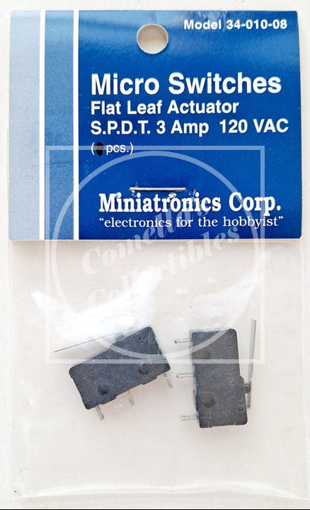 Two Miniatronics Corp. flat leaf micro switches, model 34-010-08, packaged in a clear plastic bag with a blue and white cardboard header card.