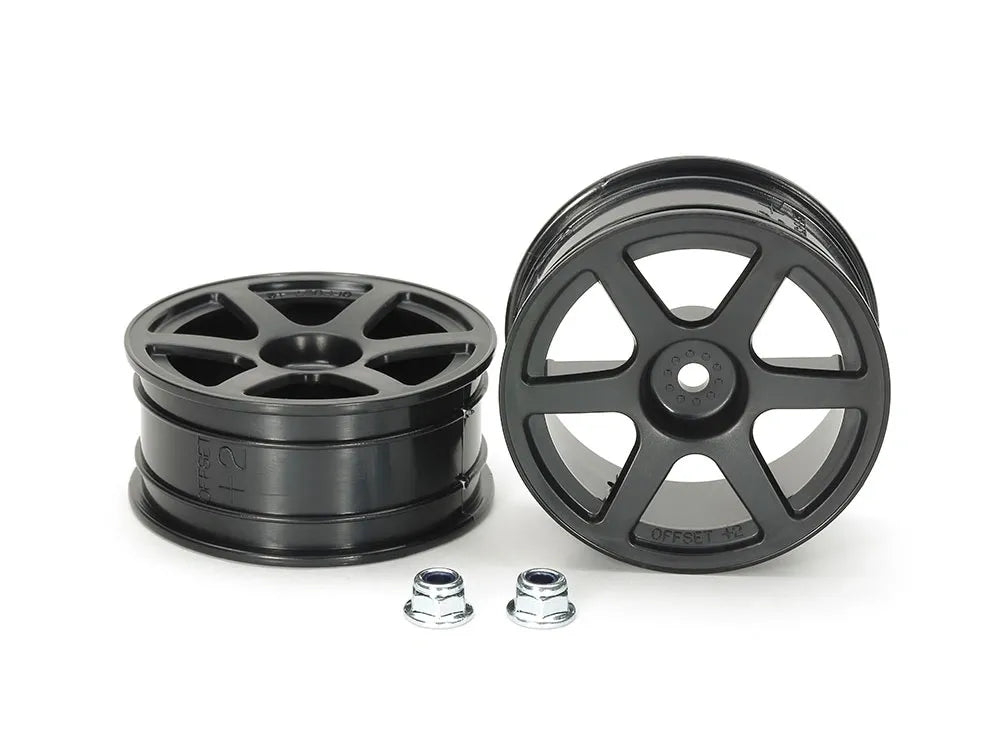 A pair of black 6-spoke model car wheels along with metal screws.