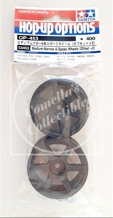 Tamiya RC parts packaging with two wheels inside, featuring the Tamiya logo.