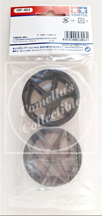 Packaged Tamiya model parts with Comella's Collectibles branding on a white background