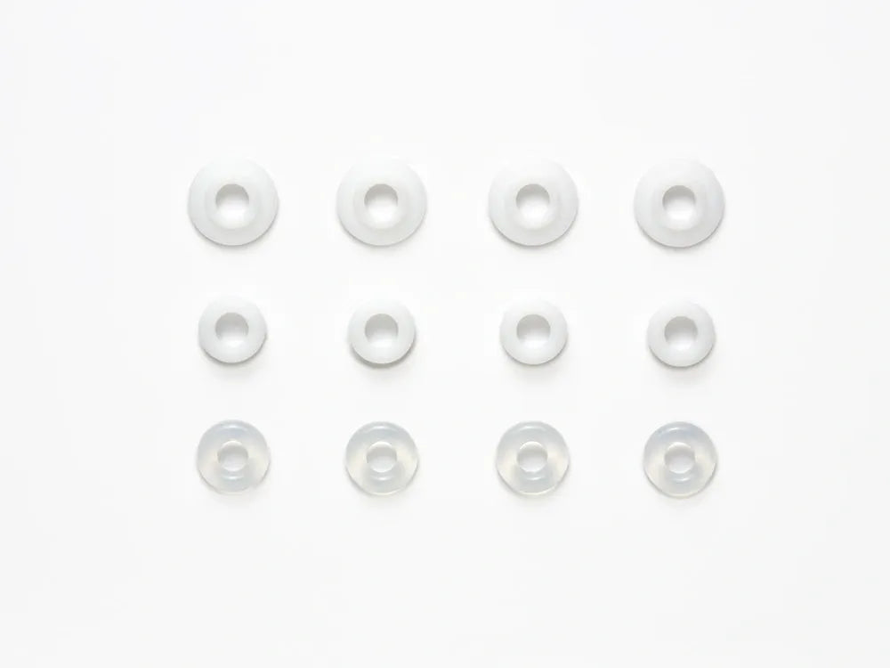A set of clear rubber O-rings and Fluorine shock rod guides for remote control car dampers.