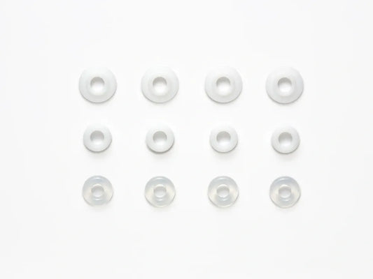 A set of clear rubber O-rings and Fluorine shock rod guides for remote control car dampers.