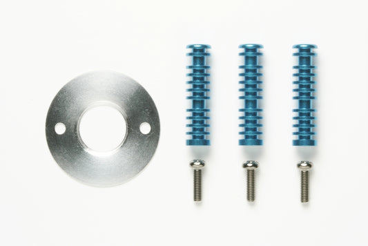 Metal washer and three blue cylindrical components on a white background