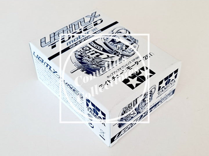 Model car engine in packaging with branding on a light gray background