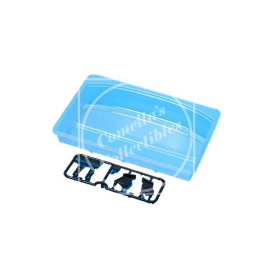 Clear plastic component with 'Comella's Collectibles' branding on a white background