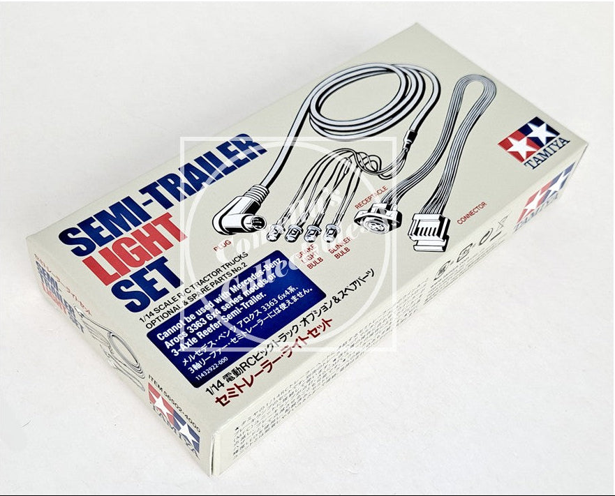 Model kit box for a semi-trailer light set on a white background
