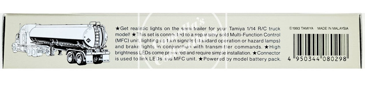 Back of a model truck packaging with text and a small illustration of a truck.