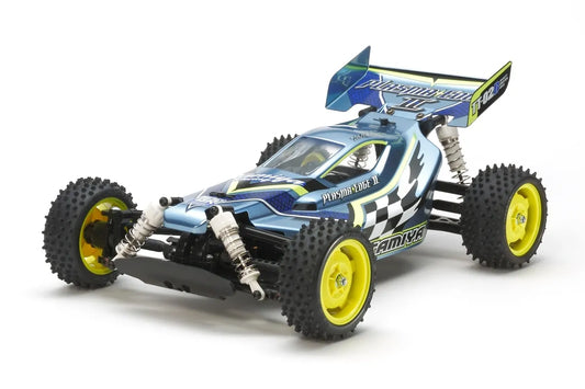 Unassembled Tamiya RC Plasma Edge II 1/10 4WD Buggy Kit with TT-02B chassis, featuring polycarbonate body and yellow star dish wheels.