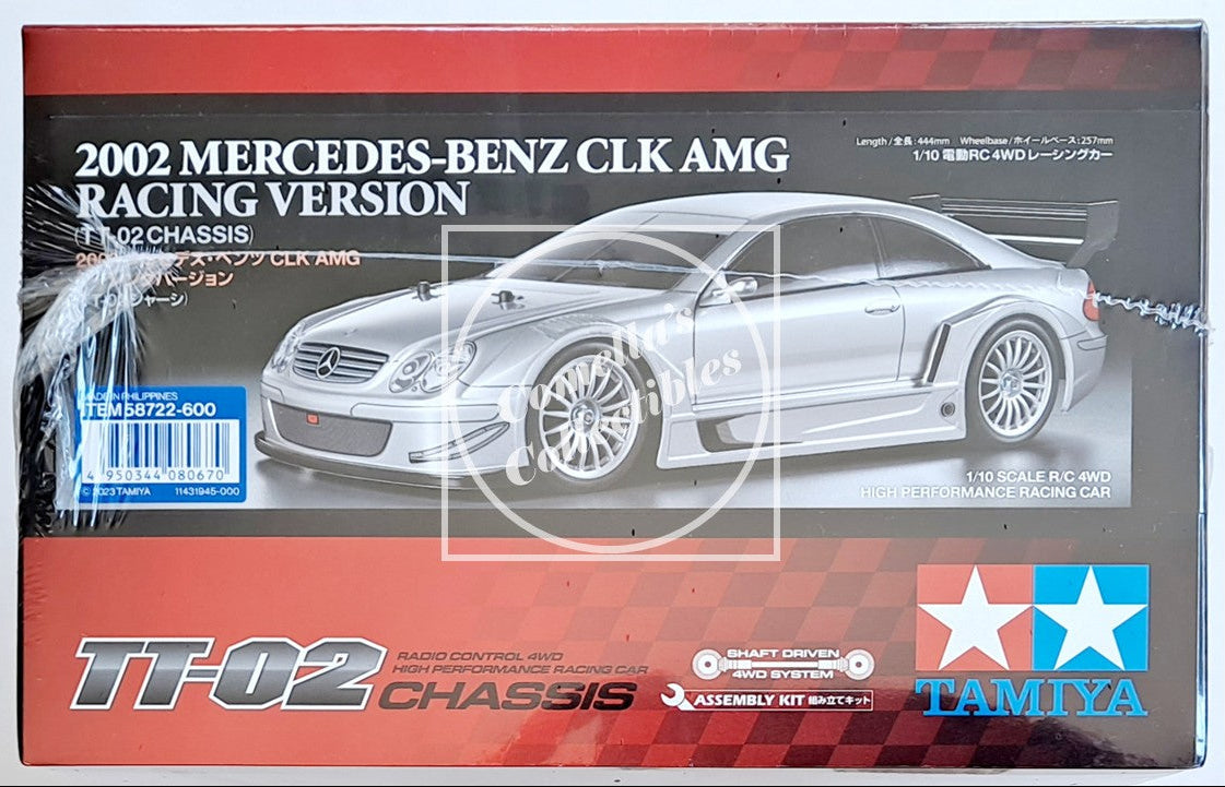 Model car kit packaging for 2002 Mercedes-Benz CLK AMG Racing Version by Tamiya on a white background