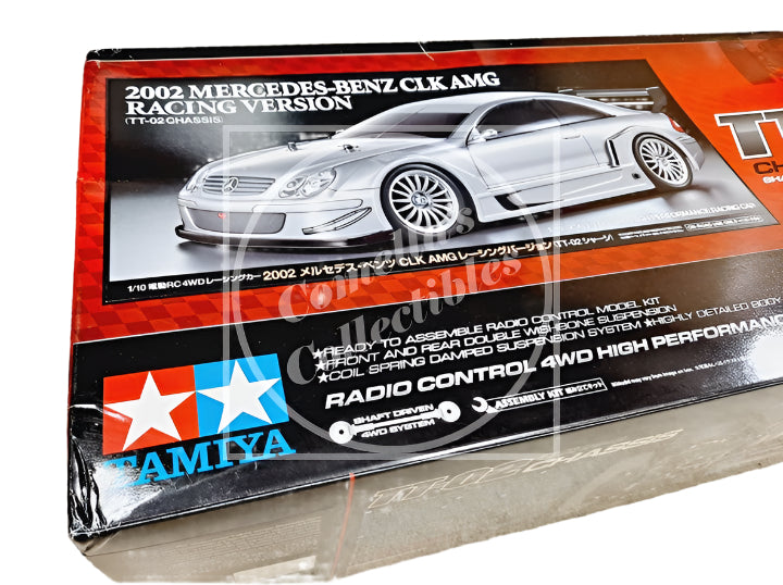 Model car kit packaging for 2002 Mercedes-Benz CLK AMG with Tamiya branding.