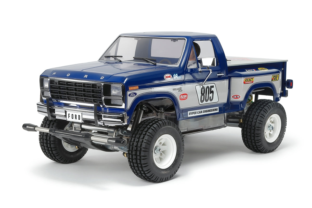 Model truck with a blue color scheme on a white background