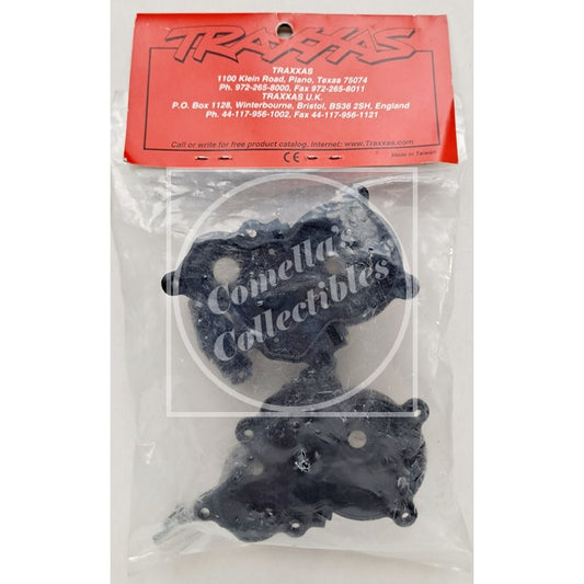 Traxxas components in clear packaging with Comella Collectibles branding.