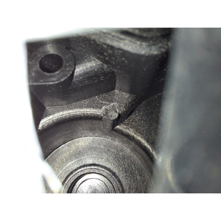 Close-up of a mechanical component with a white background