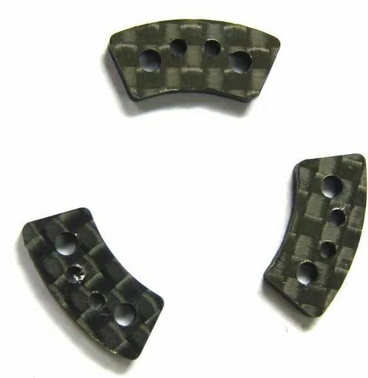 Three carbon fiber slipper clutch pads designed for Traxxas vehicles.