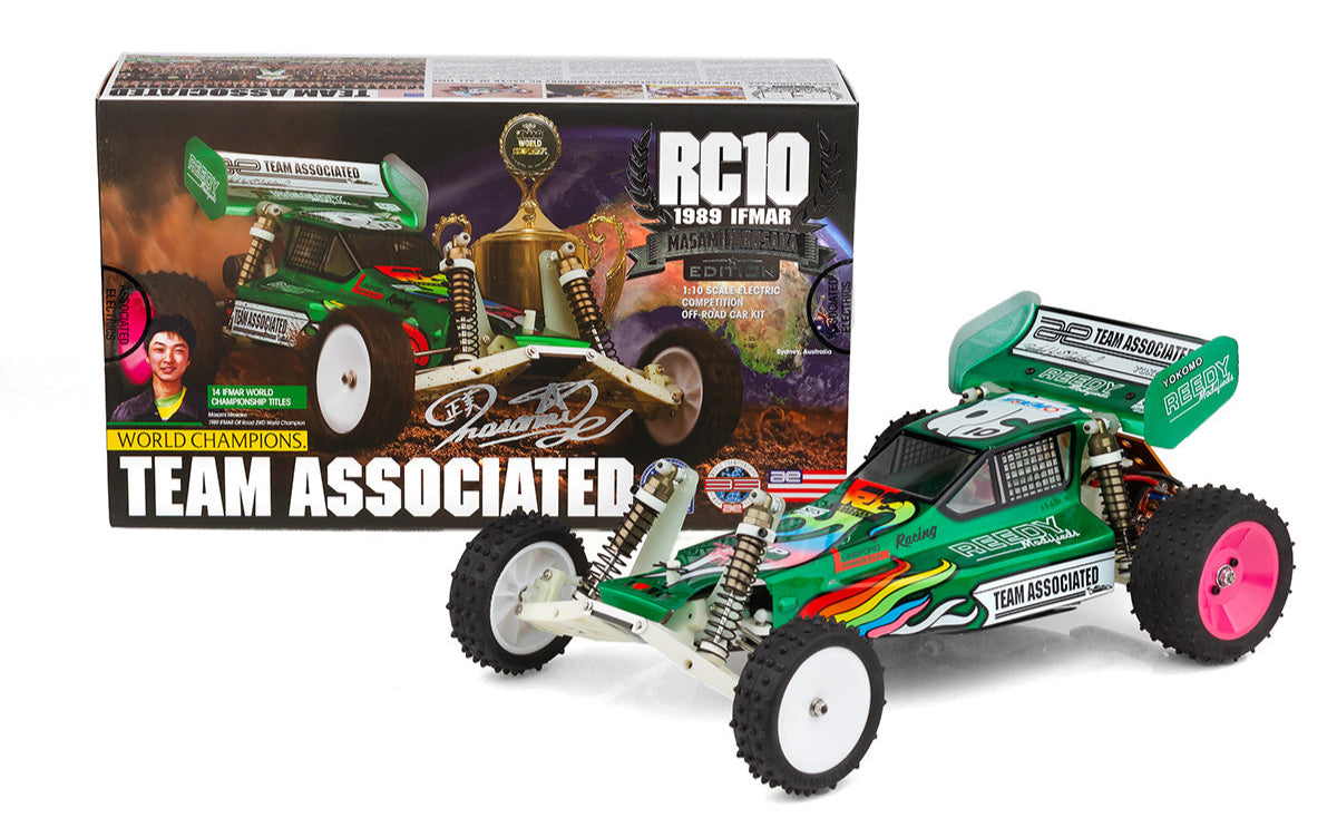 Model RC car with Team Associated branding in front of its packaging box.