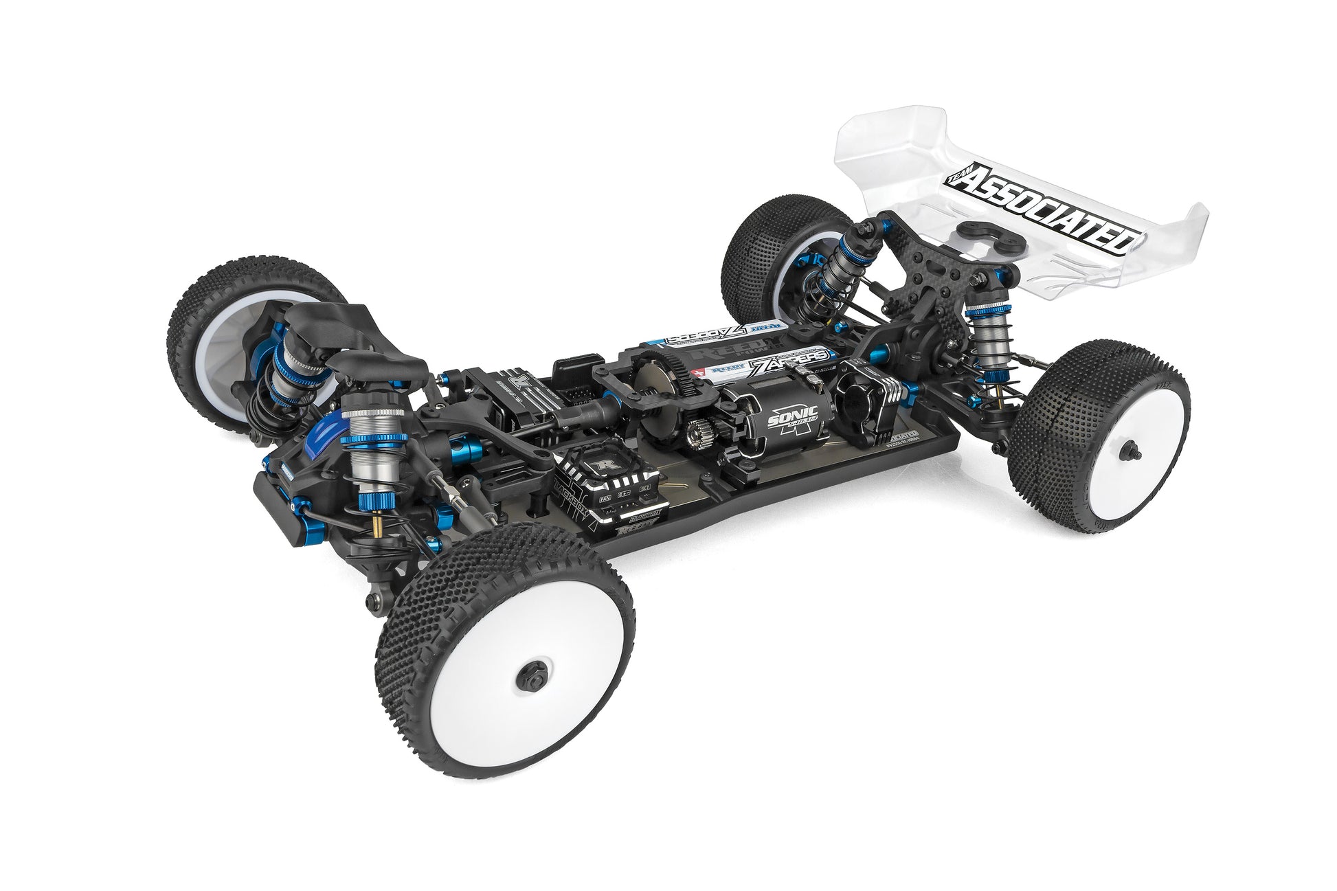 Unassembled RC car chassis with visible branding on a white background