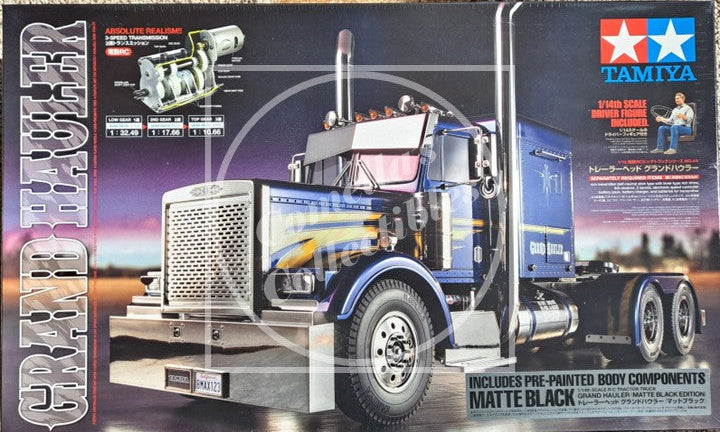 Model truck kit packaging with Tamiya branding and truck illustration