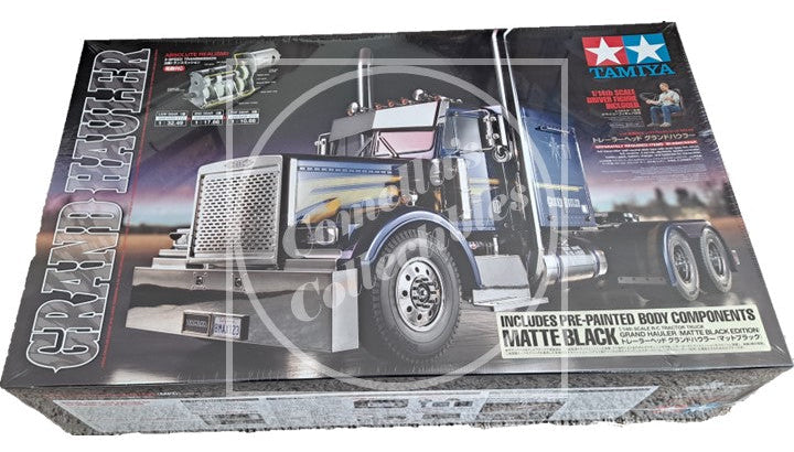 Model truck kit packaging with a truck illustration on a black background