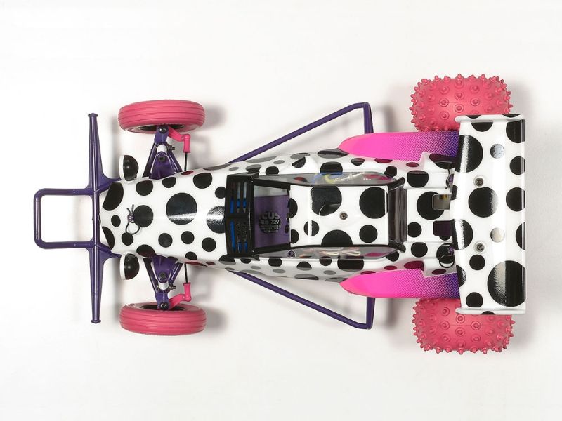 Polka dot scooter with pink wheels on a white background