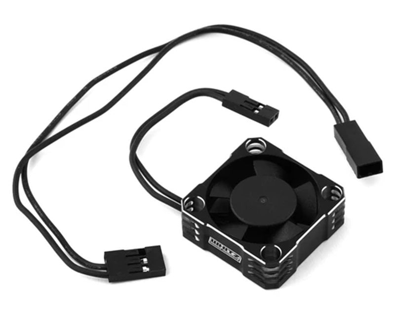 Small black cooling fan with wires on a white background