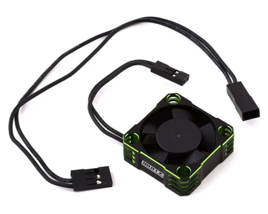 Small cooling fan with green accents and a cable on a white background