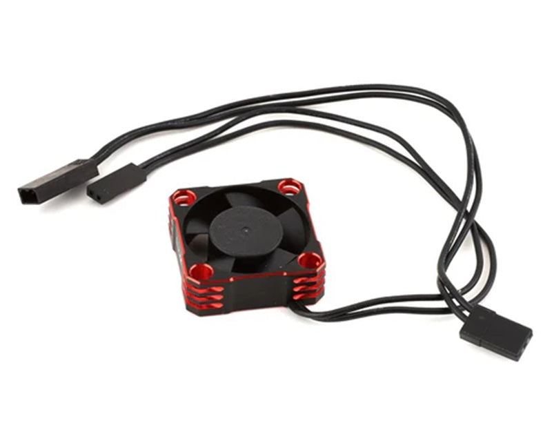 Small black and red fan with two cables on a white background